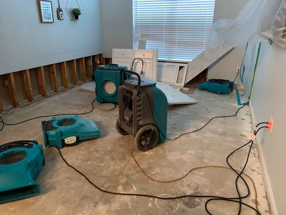 Dehumidifier in flood-cut room for Water Damage Restoration in West Falls Church